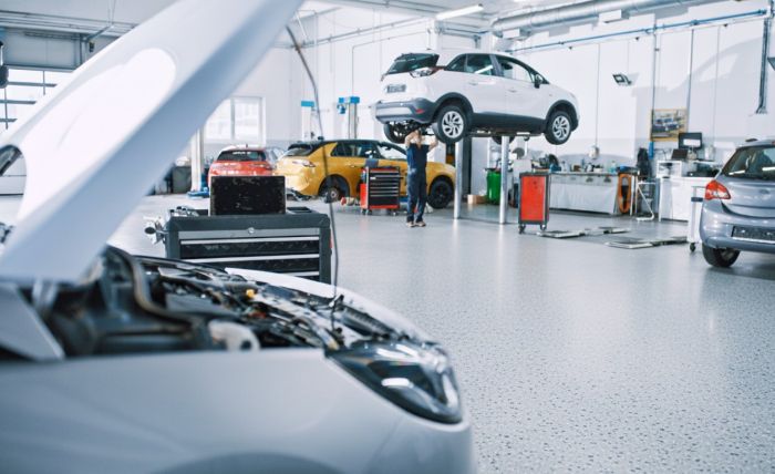 Auto Shop Floor Coating by The Coat Goat Concrete Coatings LLC