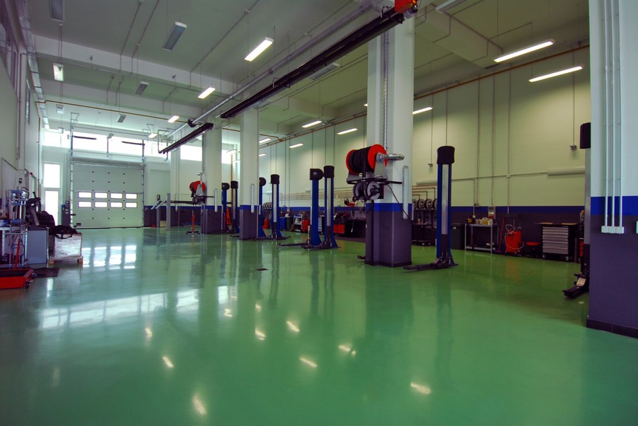 Auto Shop Floor Coating by The Coat Goat Concrete Coatings LLC